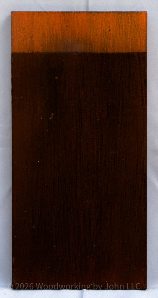 Persimmon milk paint layered over Black Iron